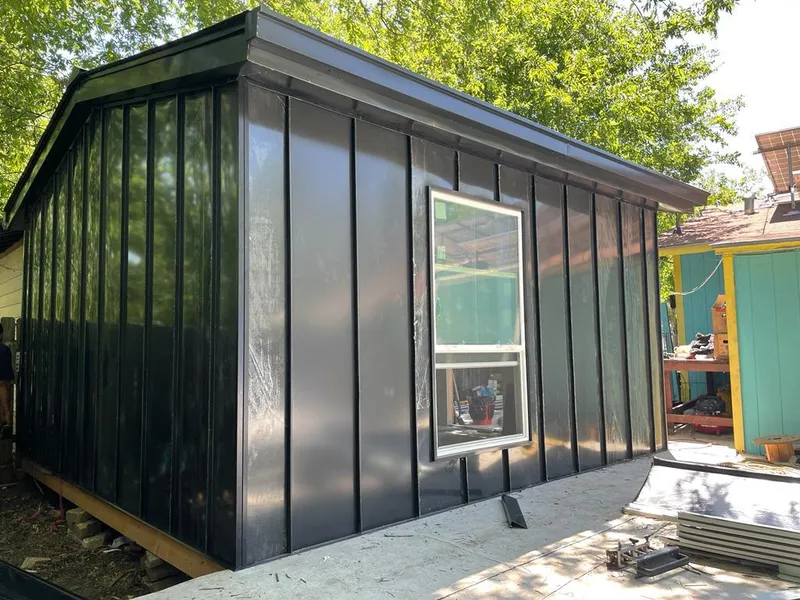 Black standing seam metal wall panels for Metal Roof Installation in Salida